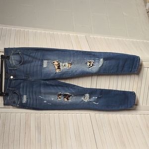 Judy blue, size 11/30, distressed with animal print